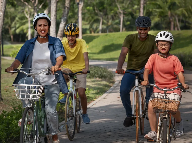 full-shot-family-cycling-outdoors
